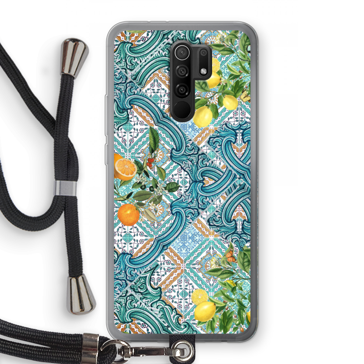 Blå kakelplattor, citroner och apelsiner